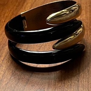 Vintage black and gold hinged clamper bracelet
